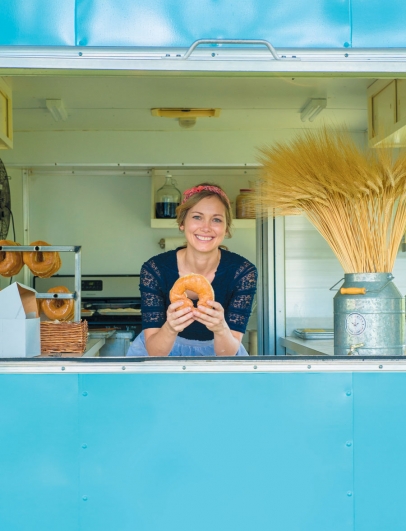 Sadie with Doughnut in Food Truck