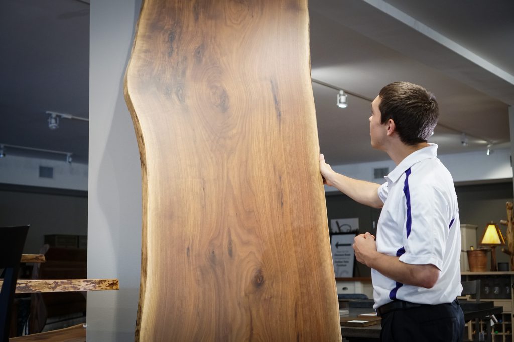 Jake Smucker with Slab of Walnut Wood with Live Edge