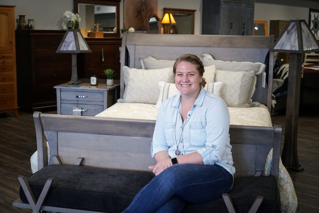 Mary Fehr with the Amish Transitions Sleigh Bed by Keystone