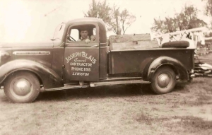 Lorraine's grandfather Joe Blais in his work truck. 