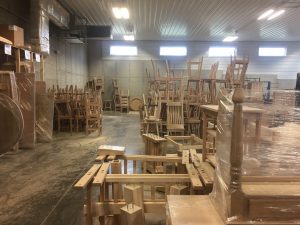 Unfinished furniture waiting for finish at Schlabach Finishing Shop.