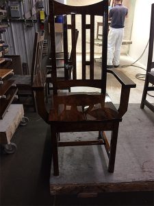 A chair with fresh finish applied.