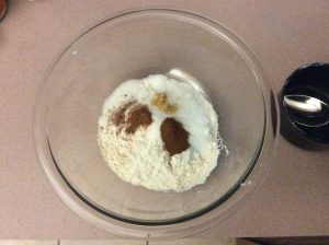 Mixing dry ingredients for Amish Homemade Pumpkin Pancakes