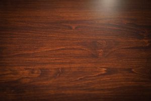 Close up of wood grain with standard varnish.