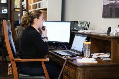 Kari Jo working in the DutchCrafters store.