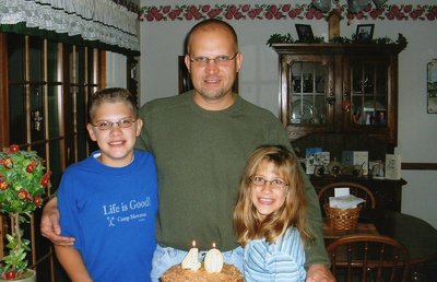 Ross with his dad and sister.