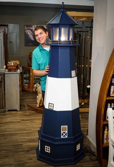 Ross with a lighthouse in the DutchCrafters Showroom