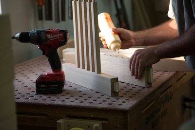 Work in an Amish woodshop.