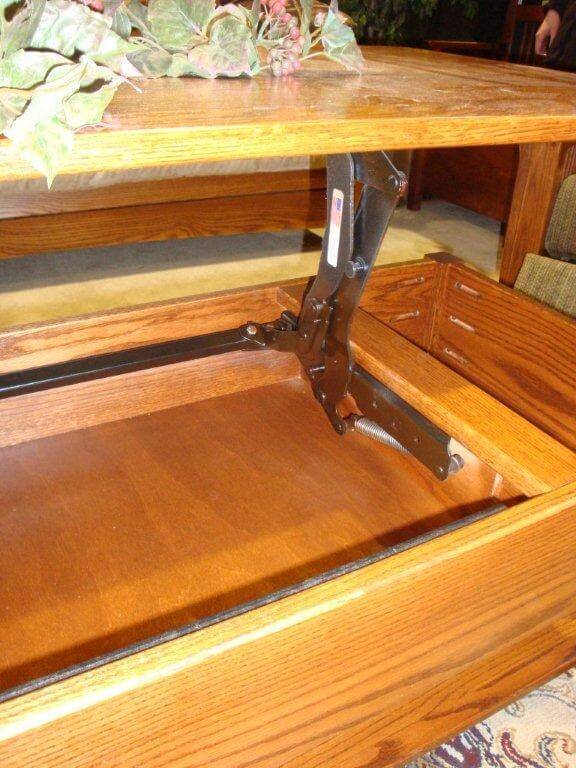 Hinge mechanism in lift-top coffee table.
