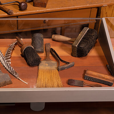 Rollers and Brushes on display at Kauffman Museum