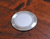 Wireless charging grommet