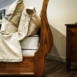 curved headboard of a sleigh bed