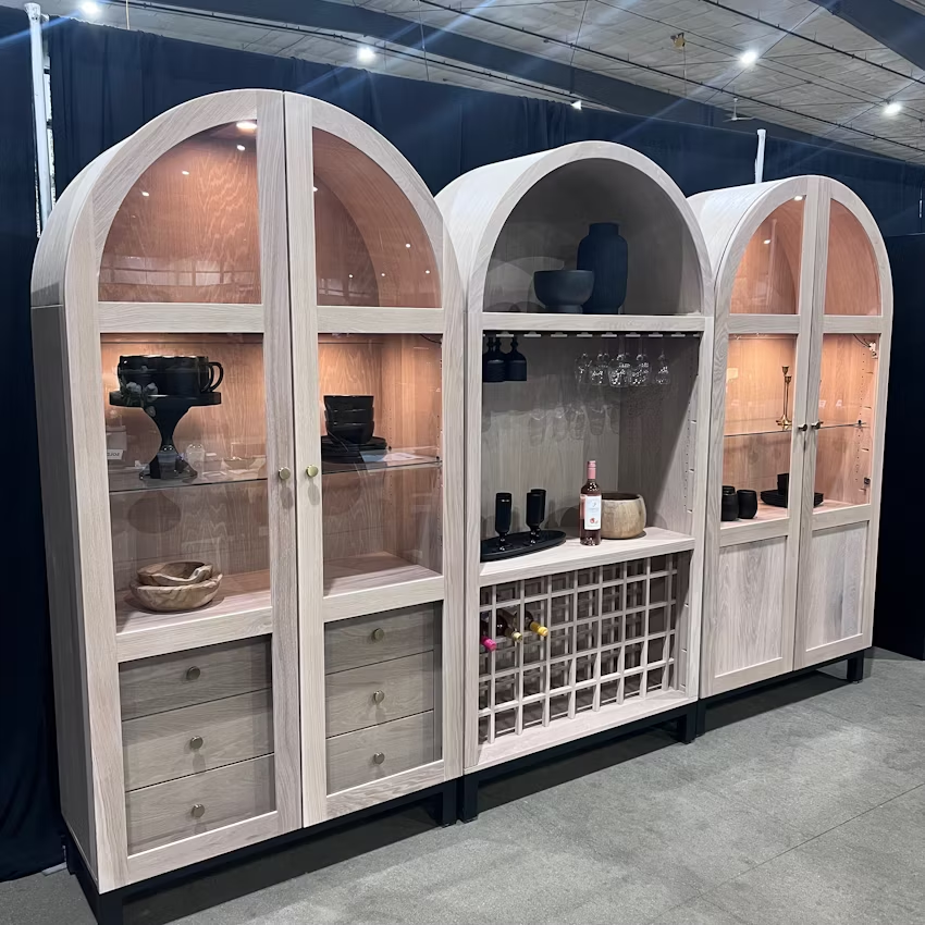 three arched cabinets lined up