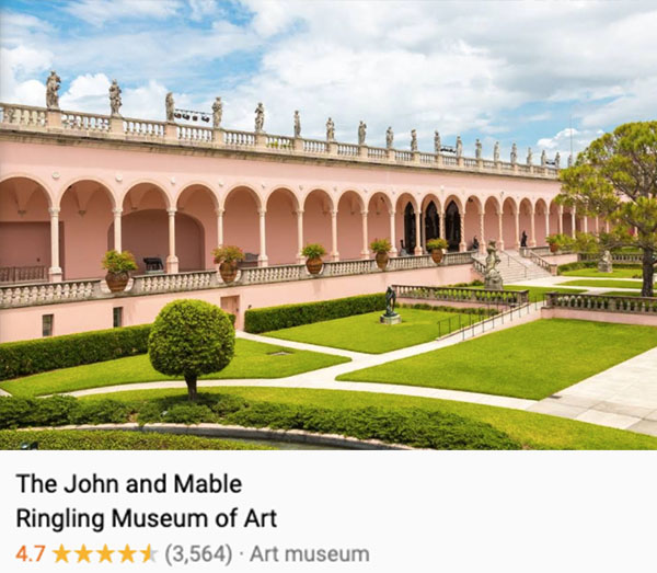 A view of the large center, well-manicured courtyard of the Ringling Museum. 