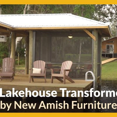 A dock is set with furniture on a lake with a house in the background, with a title that states, "A Lakehouse Transformed by New Amish Furniture"