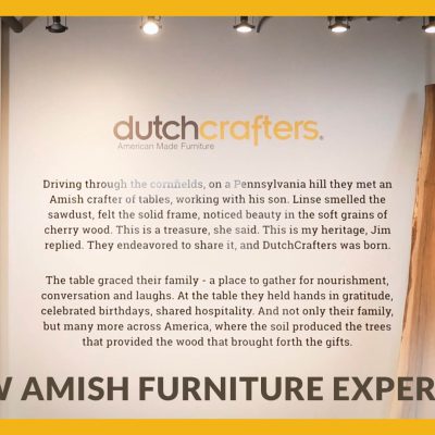 The welcome wall of the DutchCrafters Amish furniture showroom in Alpharetta, Georgia, paired with the title A New Amish Furniture Experience
